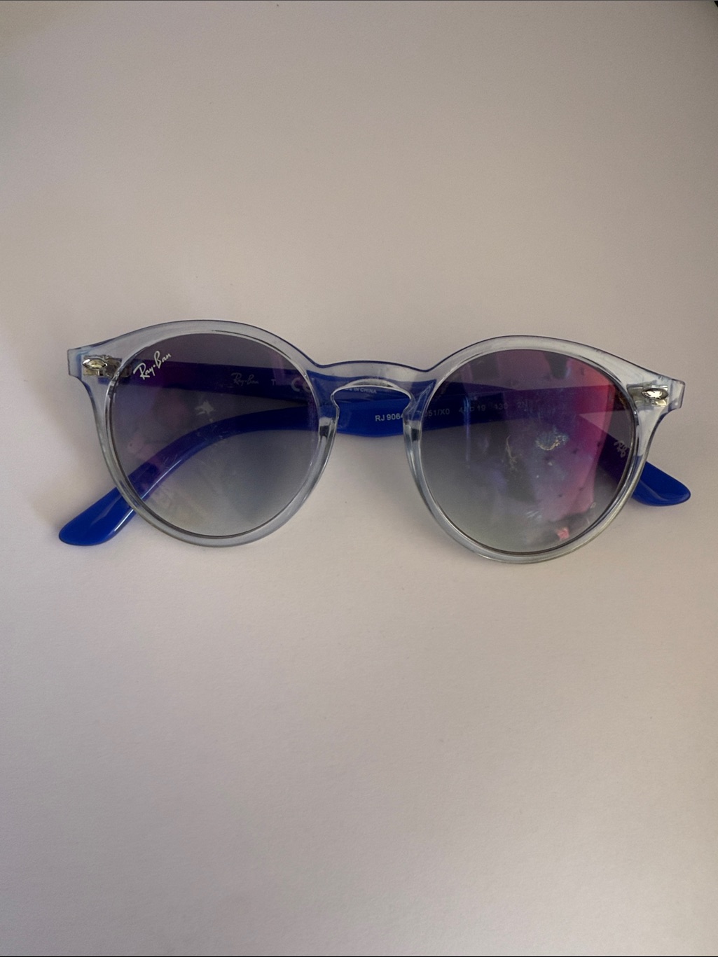 Ray-Ban Clear Frame Sunglasses With Blue Temples And Mirrored Lenses
